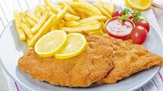 Escalopa Acompañado De Patatas Fritas