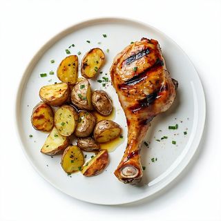 Cosce di pollo con patate