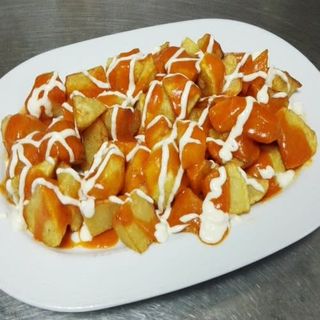 Ración De Patatas Braviolis