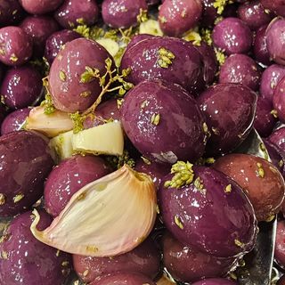 Olive nuove  350  gr condite alla Trapanese  