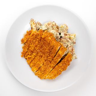 Snitel de pui în pesmet de porumb