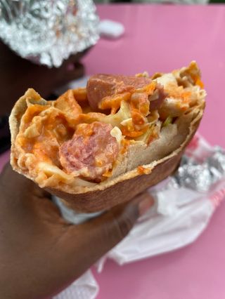 Medium Chicken shawarma one sausage (veggies with sauce and cream)