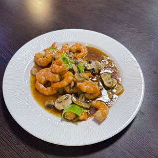 Langostinos con champiñones
