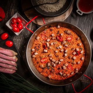 Arroz de secreto ibérico y tomate natural confitado