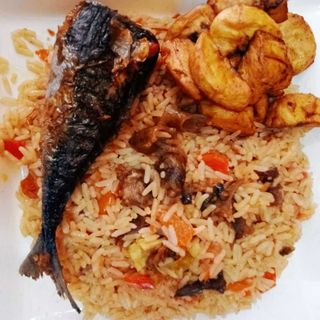 Goat meat jollof rice +Titus fish+plantain 