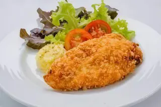 Pollo panato pollo panato con contorno a scelta