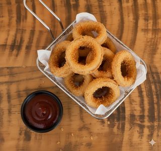 Aros de cebolla caseros con salsa BBQ (6 uds.)