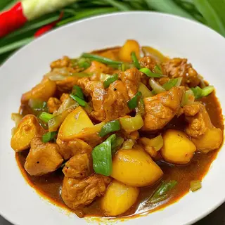 Pollo con curry
