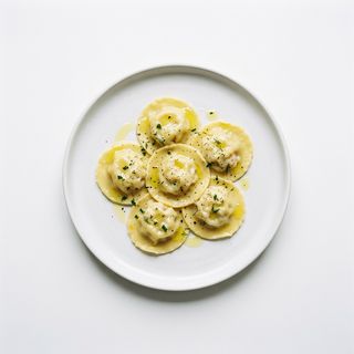 Raviolis De Lubina Y Gambas