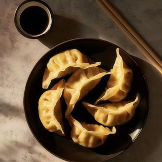 21F. Dim Sum Pan Bao con Tira de Pollo Frito 2piezas