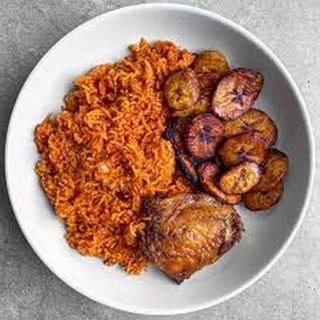 Smokey party jollof served with chicken and plantain 