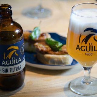 Cerveza Águila Sin Filtrar Botellín (330 Ml.)