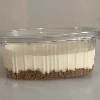 Cheesecake con salsa de fresa