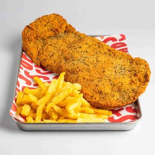Milanesa de ternera con patatas fritas