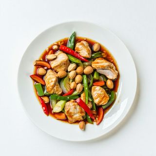 85 Pollo con noccioline