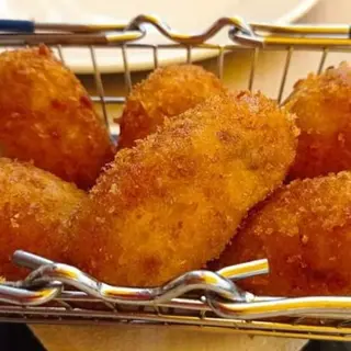 Croquetas de txipirones en su tinta (1 Ud.)