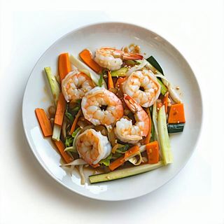 81. Gamberi con verdure miste saltate