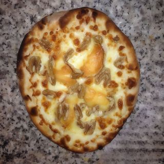 Pizza de cabra