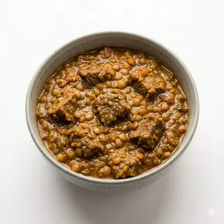 71. Cordero En Salsa Agridulce Con Lentejas