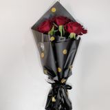Trois roses rouges