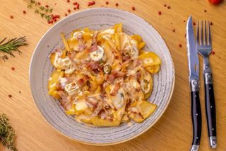 Dippers con bacon croccante e fonduta cheddar