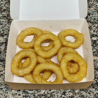 Anelli di cipolla pastellati