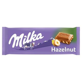 Czekolada mleczna z orzechami Milka. 0.1кг
