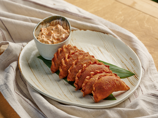 Вареники смажені з капустою та копченостями (210г)