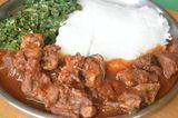 Beef Muchomo Pan Fried served with half chips and half rice