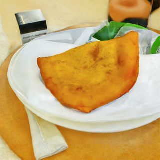 Panzerotto rape, burrata e pomodoro secco