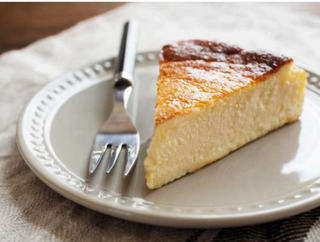Tarta de queso casera (porción)
