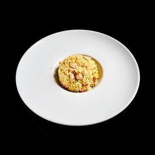 RISO SALTATO CON SALMONE