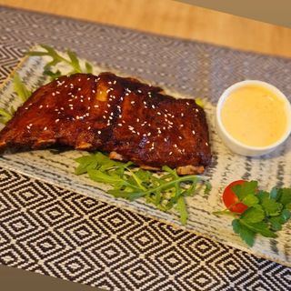 Coaste de porc cu sosul casei