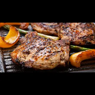 Plato De Bistec De Cerdo con Papas Fritas