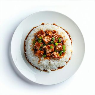 70. Riso coperto di carne di maiale alla yuxiang