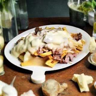 1263. Patate con porchetta e formaggio