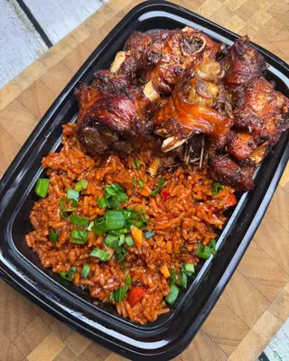 Jollof Rice + Protein + Coca Cola