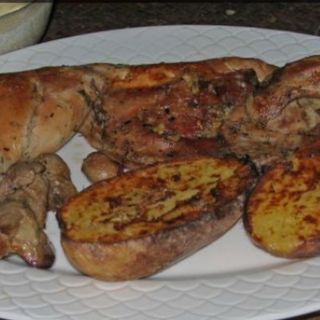 Conejo A La Brasa Con Guarnición