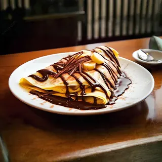 Crêpe nutella banane avec chocolat chaud fondu à l`ancien