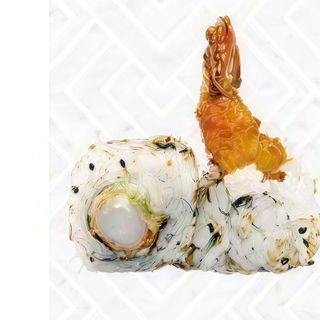 88.Uramaki langostino cubierto de alga fina (4 Uds.)