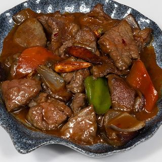 60.- Ternera con Salsa Picante  