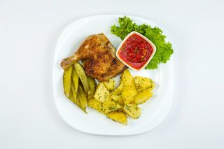 Цыпленок на гриле с молодой  картошкой (500 гр.)