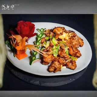 G15.	Aripioare de pui Ganbian/干煸鸡翅/Dry fried chicken wings **