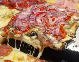 Pizza Vegetariana (Porción)