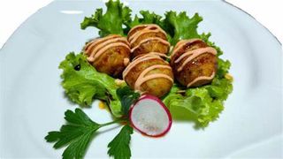 4. Takoyaki - 3 pezzi