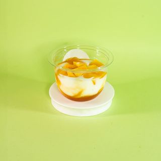 YOGUR NATURAL DE MANGO Y MARACUYA CON MUESLI