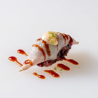 254. Black maguro flambe