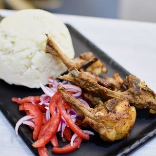 Choma Goat Ribs with Ugali and Kachumbari 