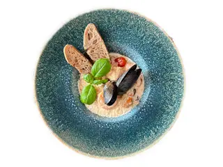 Фірмове соте з морепродуктів з кус-кусом у вершковому соусі (330г)