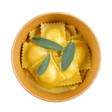 Ravioles de queso cabra ahumado y cebolla caramelizada 